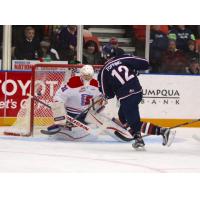 Jordan Topping of the Tri-City Americans Shoots on the Spokane Chiefs