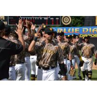 Sussex County Miners congratulate each other on a win