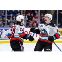Kelowna Rockets right wing Andrew Cristall and left wing Carson Golder